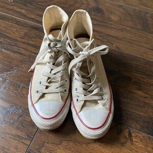 Converse Chuck Taylor cream high top sneakers